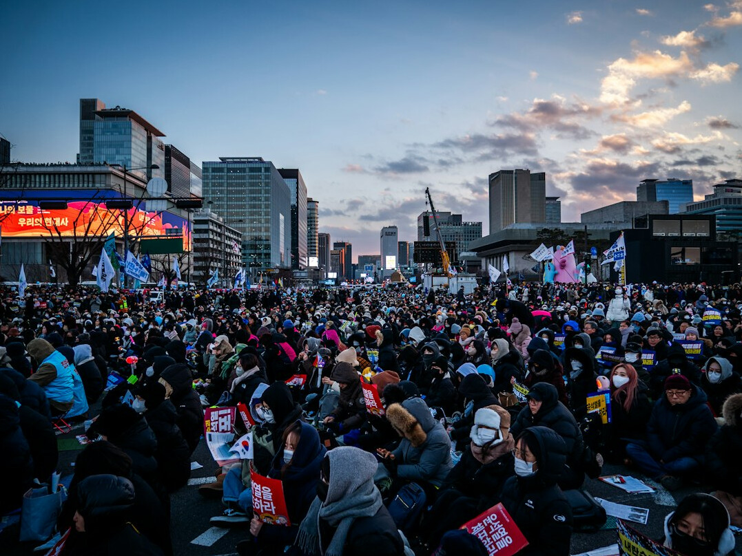 diverse crowd at political rally